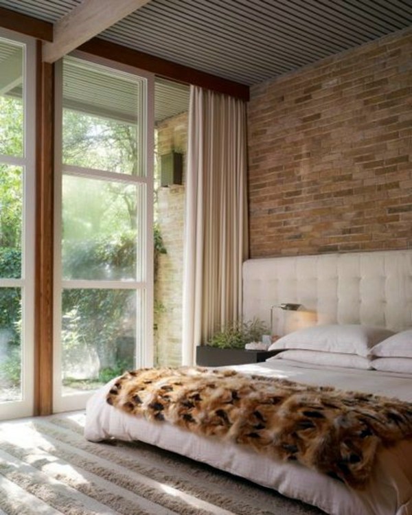 How you could decorate a brick wall behind your bed 31 ideas