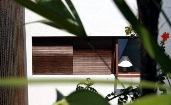 Modern house with a pond in the garden