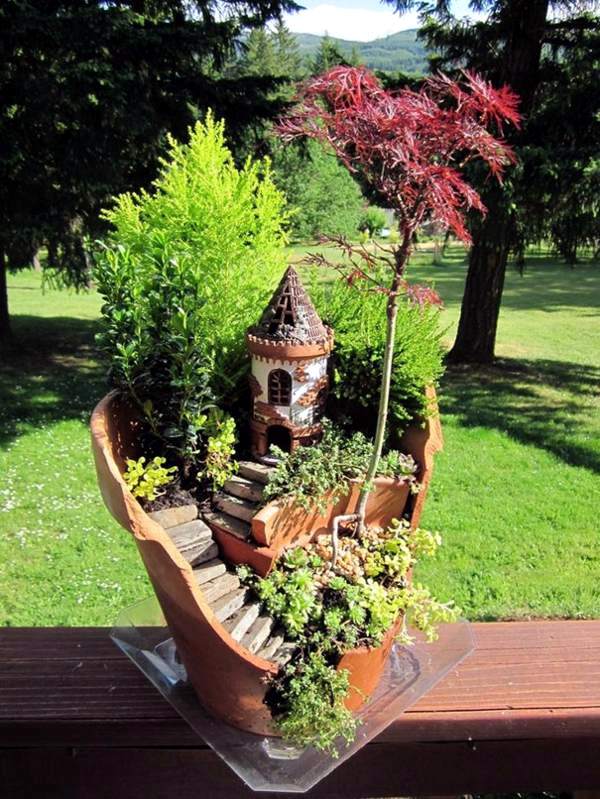 Creative Landscaping with broken plant pots