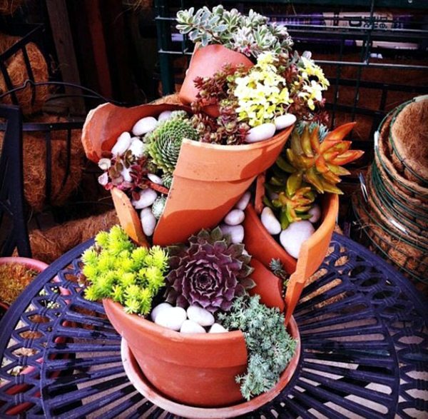 Creative Landscaping with broken plant pots