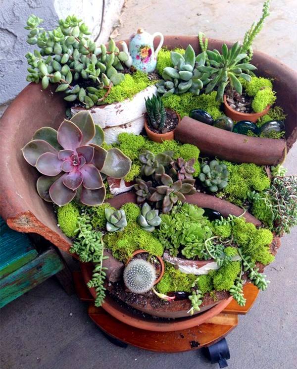 Creative Landscaping with broken plant pots Creative Landscaping with broken plant pots