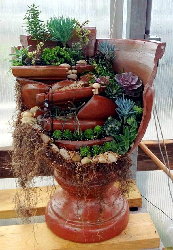 Creative Landscaping with broken plant pots