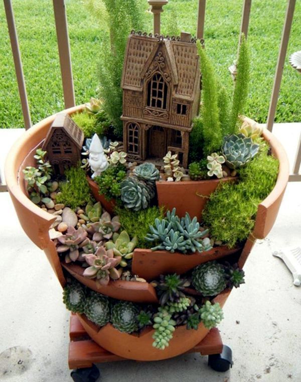 Creative Landscaping with broken plant pots