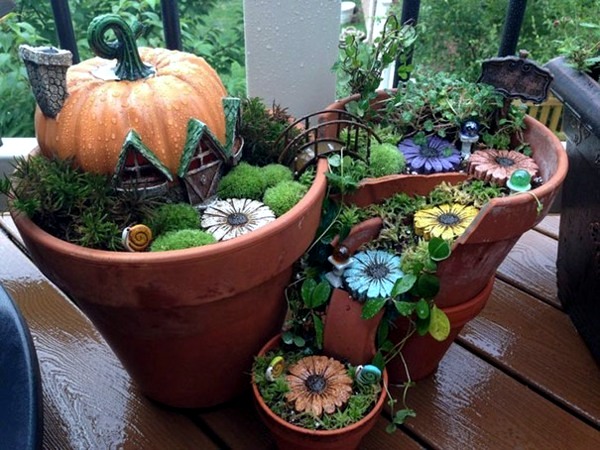 Creative Landscaping with broken plant pots