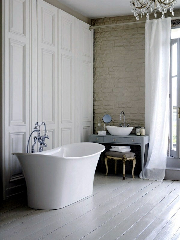 Freestanding bathtub in modern bathroom