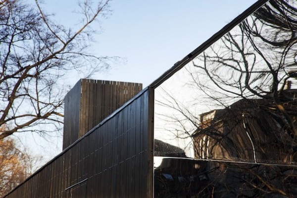Designer house located with mirrored façade in Copenhagen