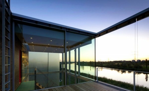Modern house on the water with an industrial look Modern house on the water with an industrial look
