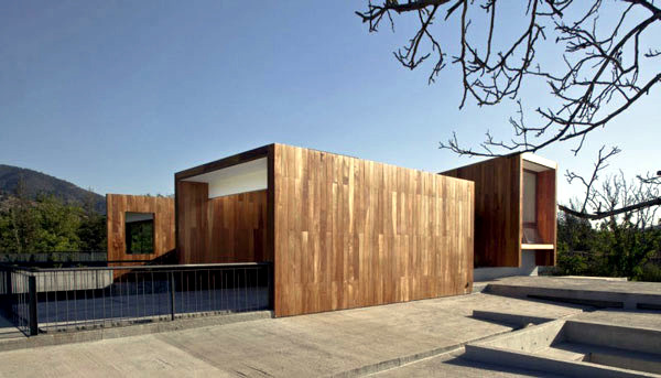 Wide modern house mix natural materials
