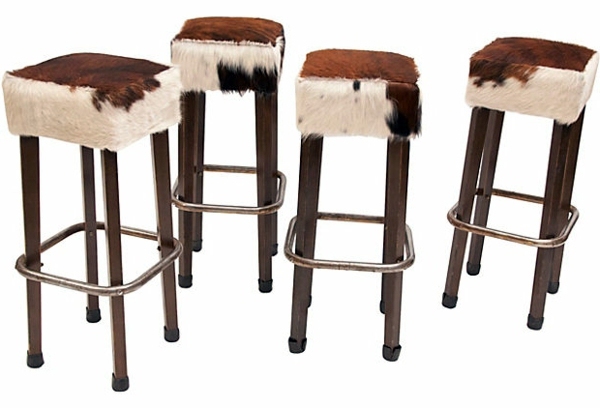 Sessel - Kuhfellhocker and armchair - Cowhide as extravagant padding