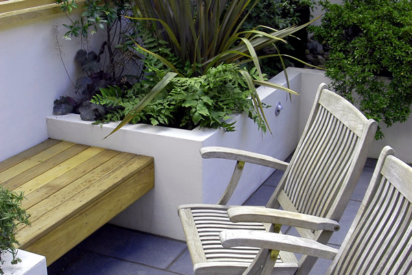 The modern garden bench made of wood The modern garden bench made of wood