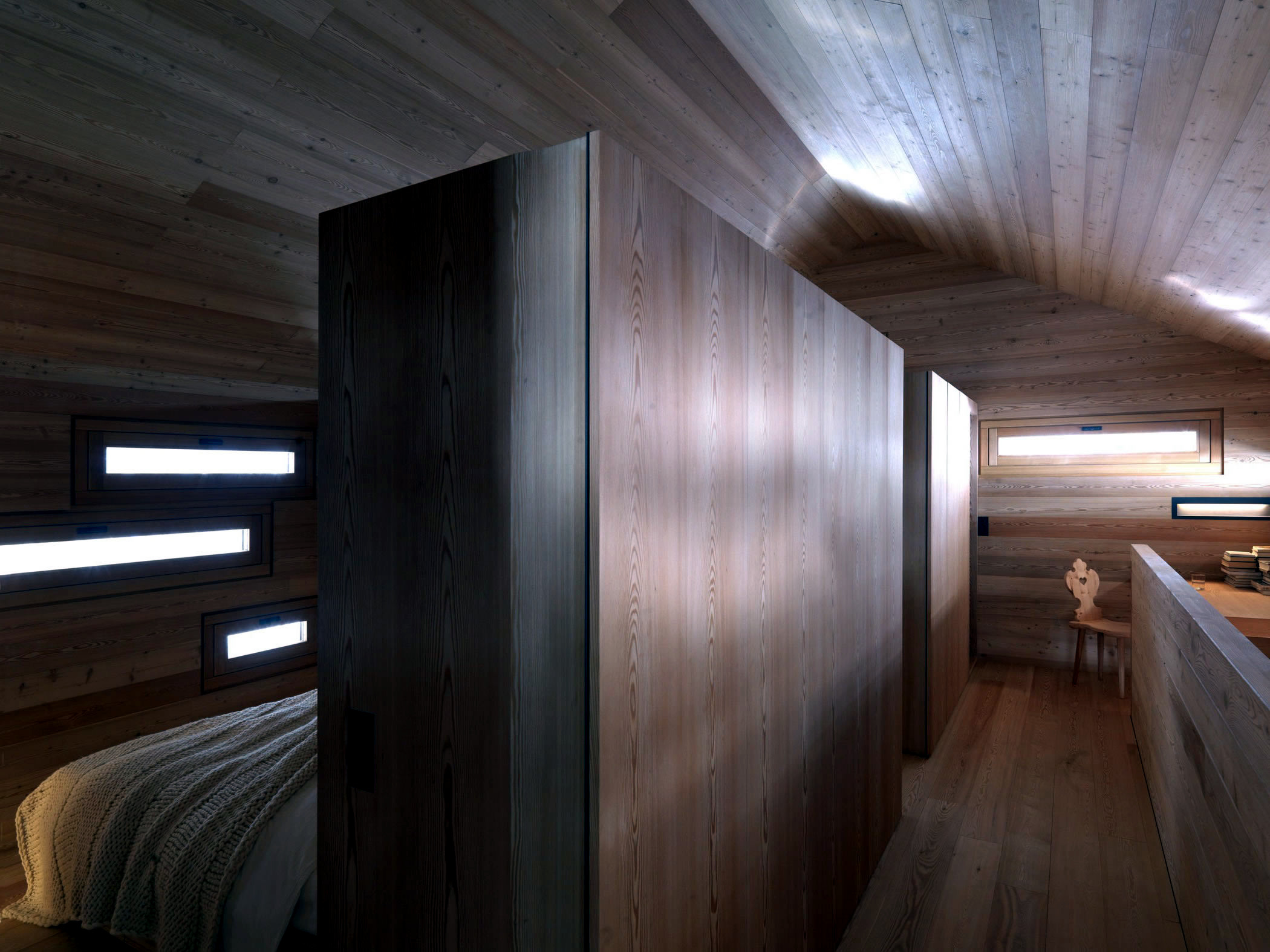 Interior design of a paneled entirely with wood cabin