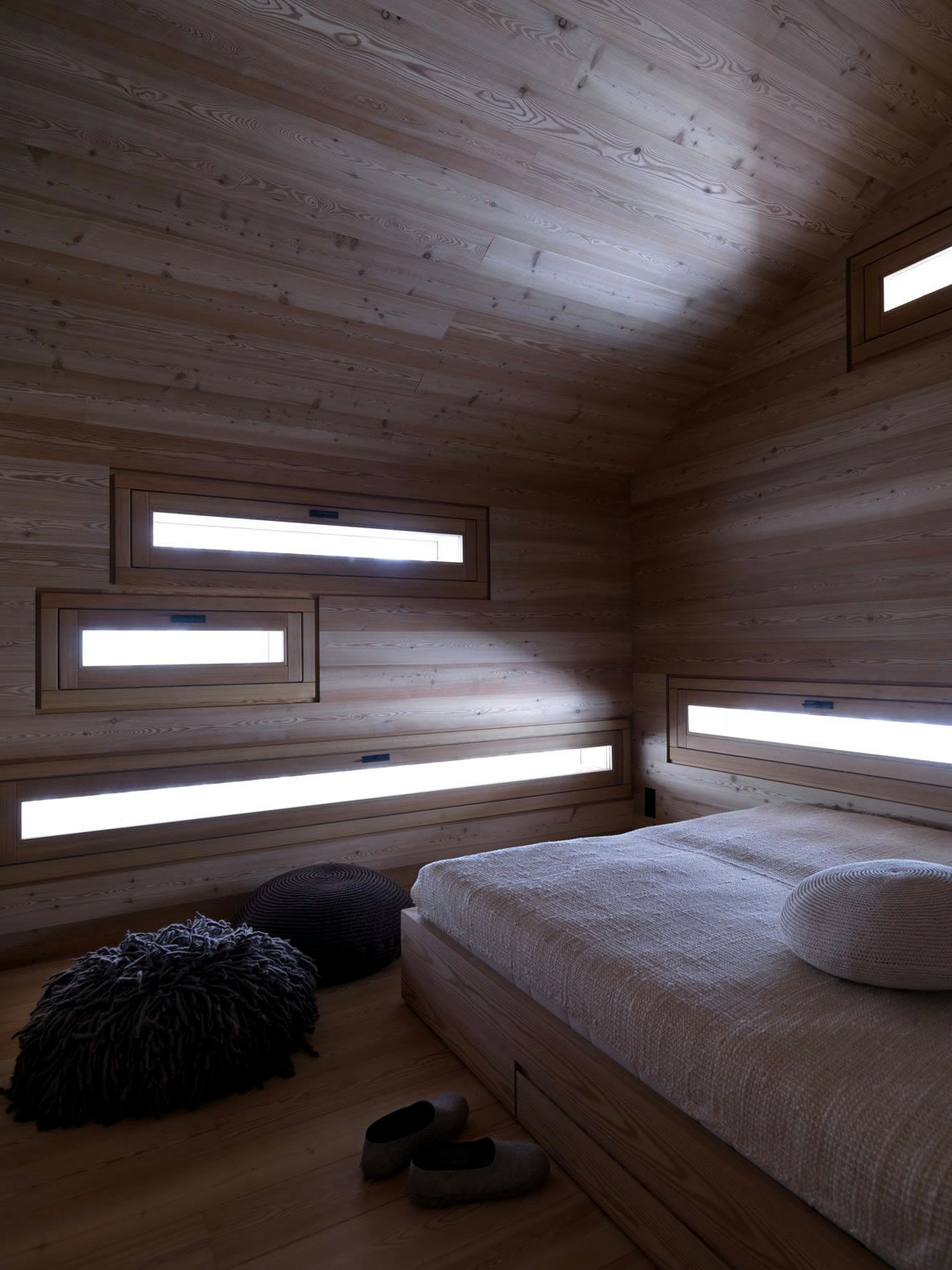 Interior design of a paneled entirely with wood cabin