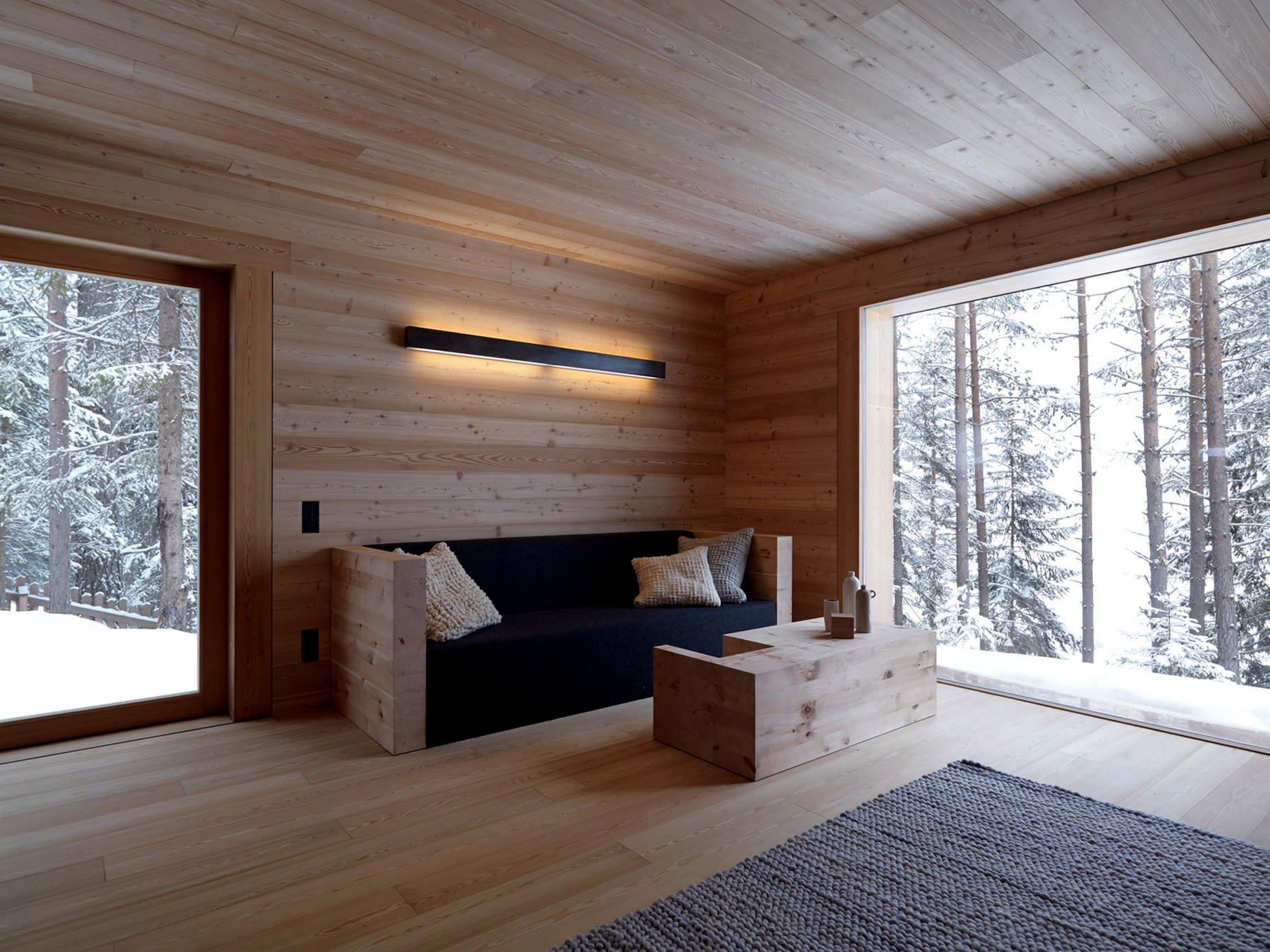 Interior design of a paneled entirely with wood cabin