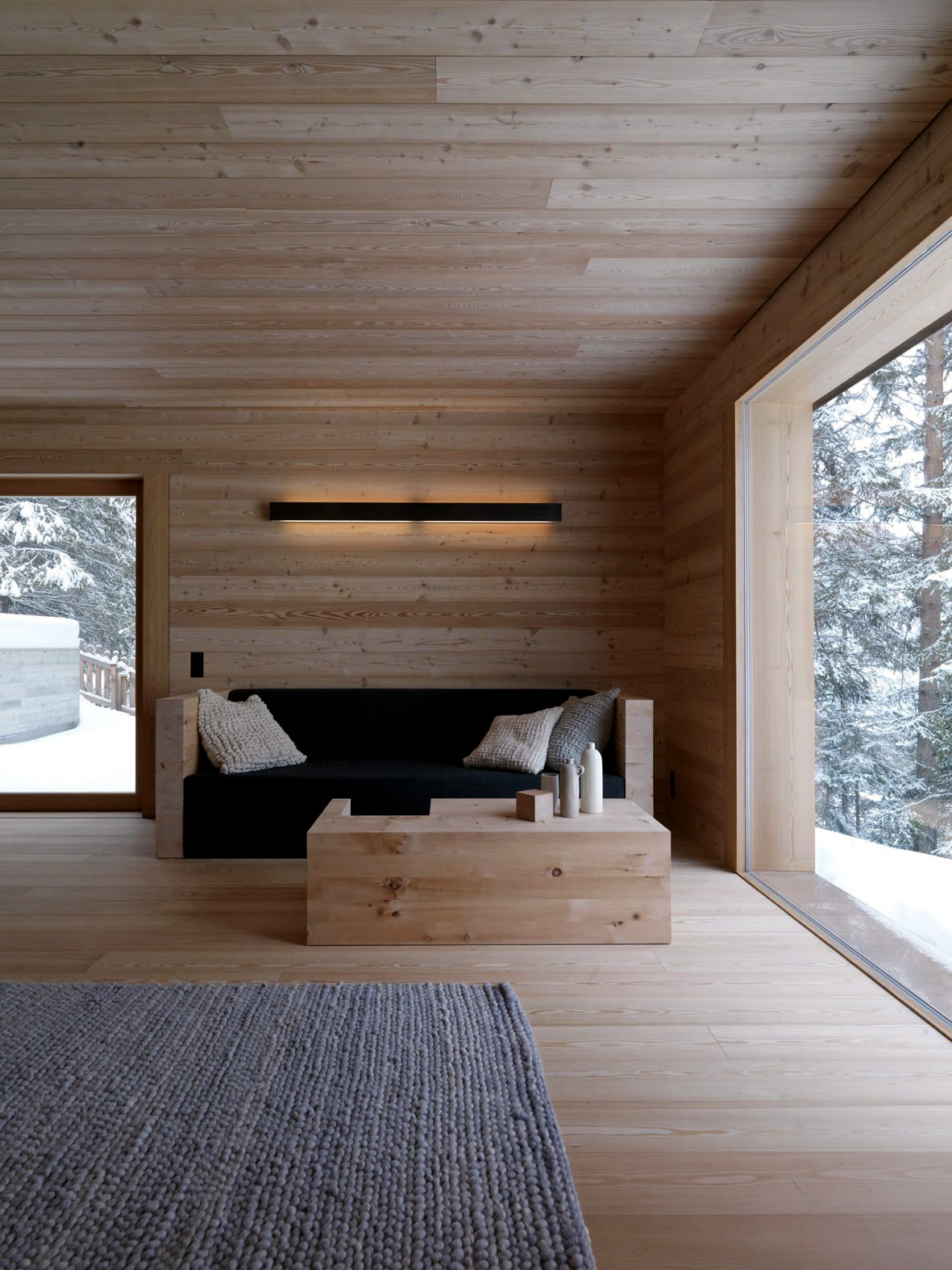 Interior design of a paneled entirely with wood cabin | Interior Design