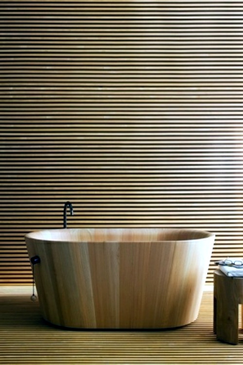 Attractive bathroom with bath from wood