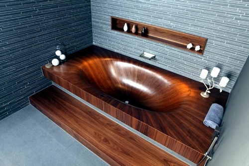 Attractive bathroom with bath from wood Attractive bathroom with bath from wood