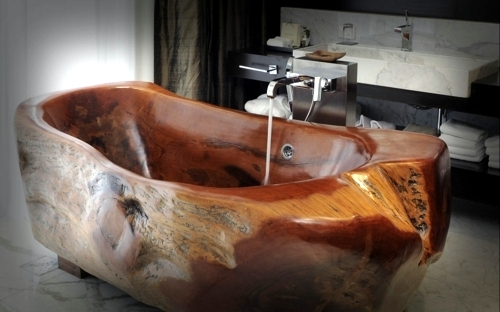 Attractive bathroom with bath from wood Attractive bathroom with bath from wood