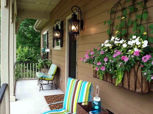 Flower boxes at the windows in different styles