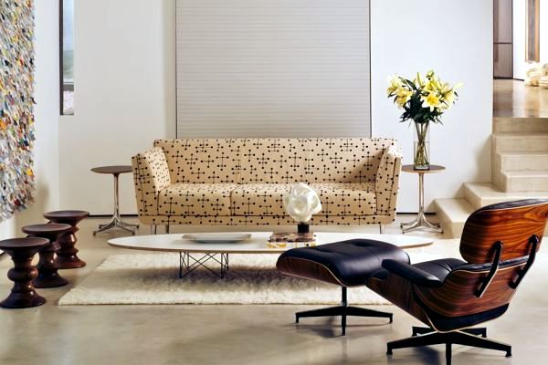 Eames walnut stool and elliptical coffee table - timeless design classics