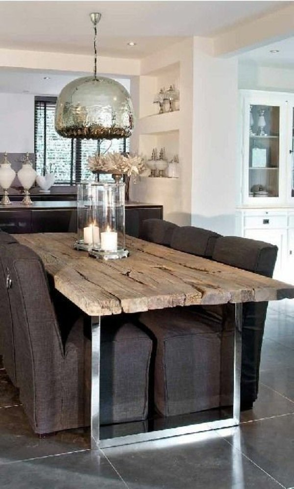 Dining room table with chairs that create a modern feel Dining room table with chairs that create a modern feel