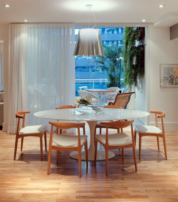 Dining room table with chairs that create a modern feel