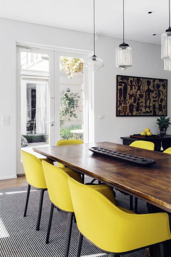 Dining room table with chairs that create a modern feel