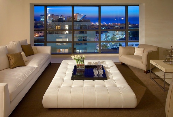 Send ottoman use as a side table - a versatile piece of furniture with style