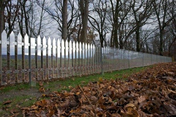Mirror picket fence reflects the landscape Mirror picket fence reflects the landscape