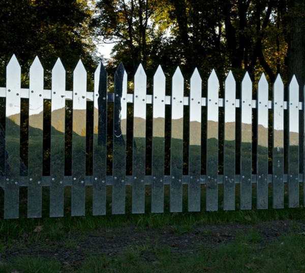 Mirror picket fence reflects the landscape Mirror picket fence reflects the landscape