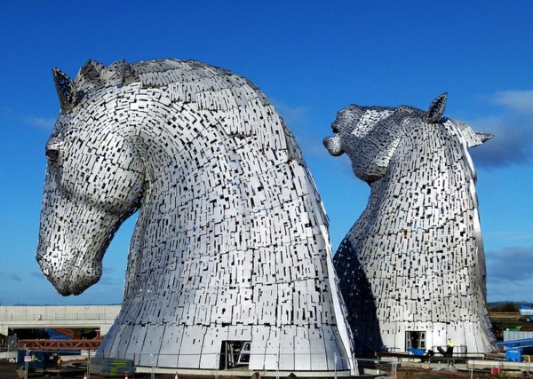 Huge Kelpies horse head sculptures tower over the Forth & Clyde Canal in Scotland