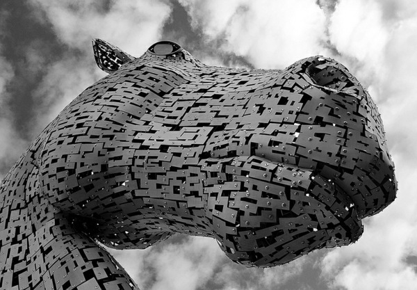 Huge Kelpies horse head sculptures tower over the Forth & Clyde Canal in Scotland