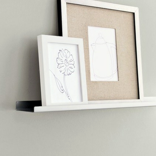 Forget the bare walls - design your art gallery with picture frames on the wall