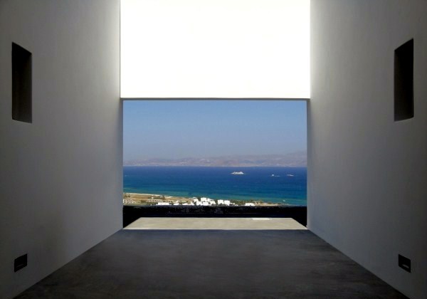 Modern cottage on the slopes of a rocky coast Modern cottage on the slopes of a rocky coast