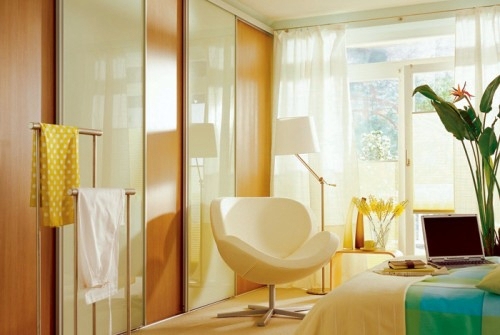 Bedroom in the attic with a large dressing room