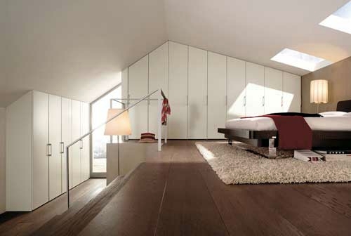 Bedroom in the attic with a large dressing room