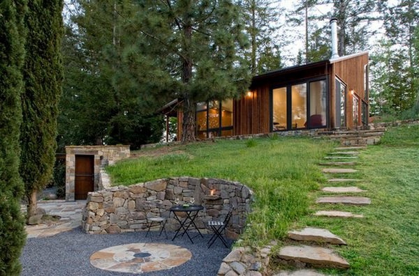 Install pebbles and river stones - beautiful landscape in the garden Install pebbles and river stones - beautiful landscape in the garden
