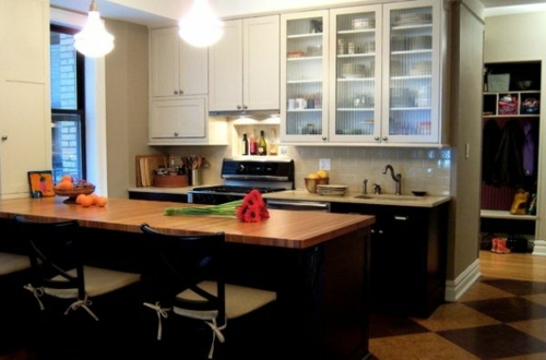 China cabinet and glass display case for a bright kitchen