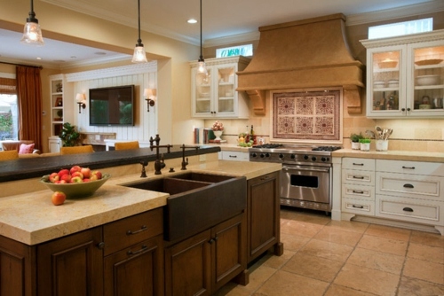 How should one choose the material of the sink in the kitchen